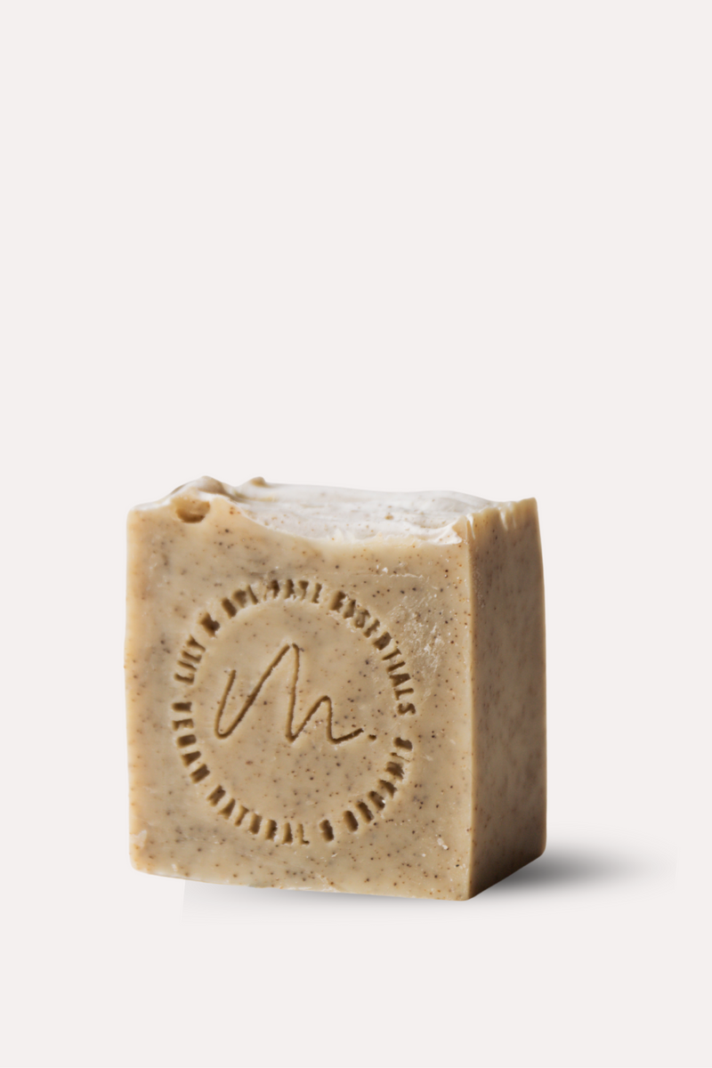 Bar of soap with a brand logo on a white background