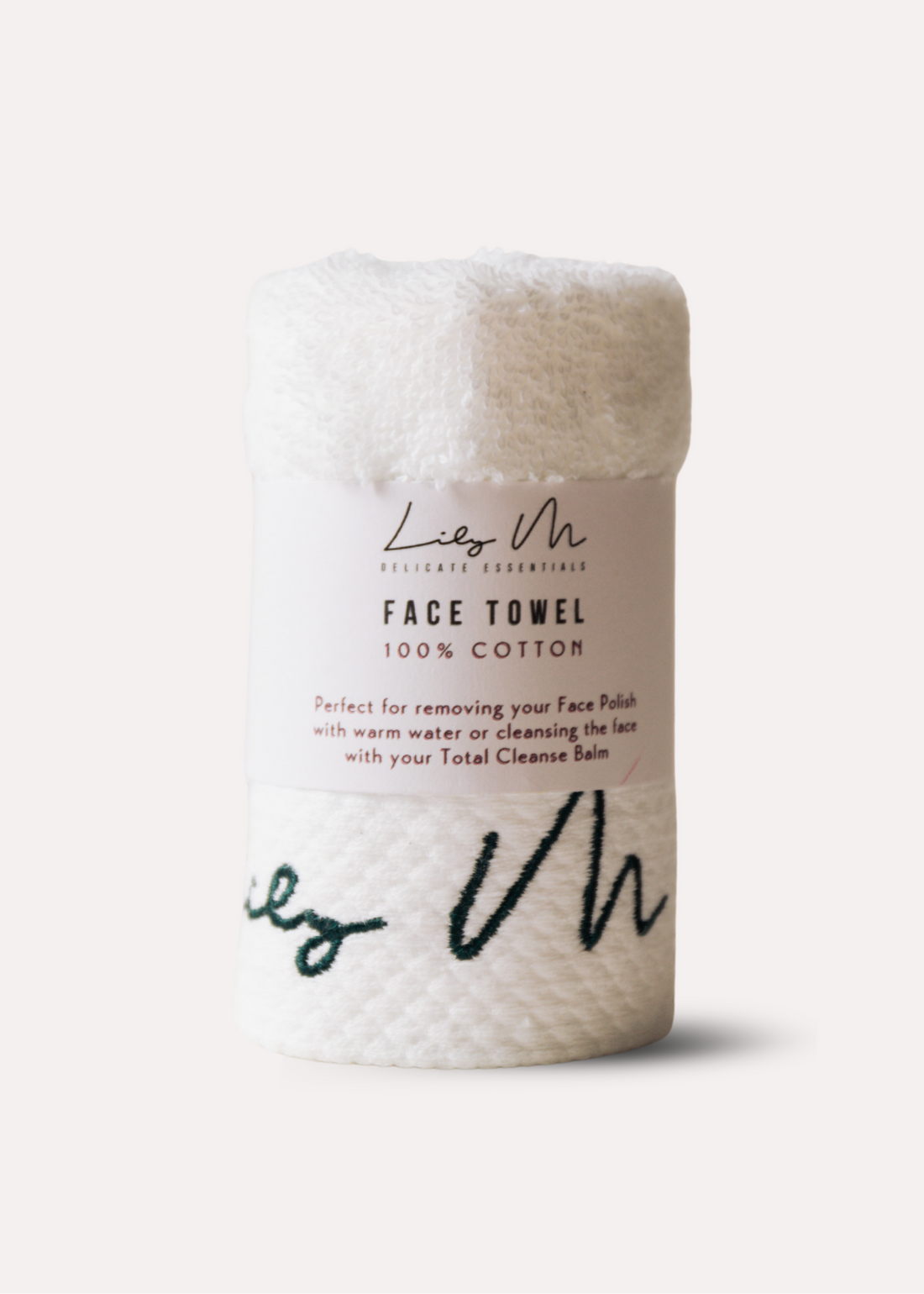 Face towel with Lily M branding on a white background