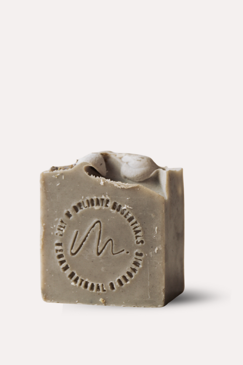 Bar of soap with a logo on a white background