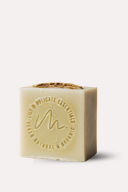 Bar of soap with a logo on a white background